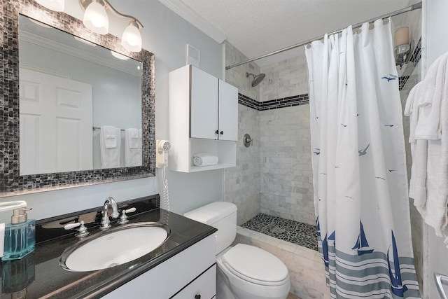 bathroom with vanity, toilet, walk in shower, and ornamental molding