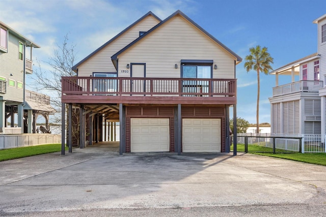 view of front of home featuring a wooden deck and a carport