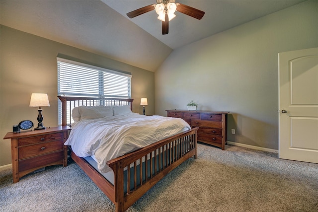 carpeted bedroom featuring ceiling fan and lofted ceiling