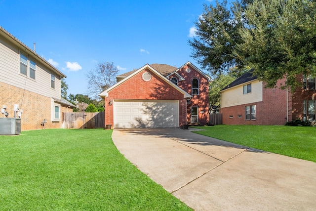 view of front of house featuring central AC unit, a garage, and a front yard