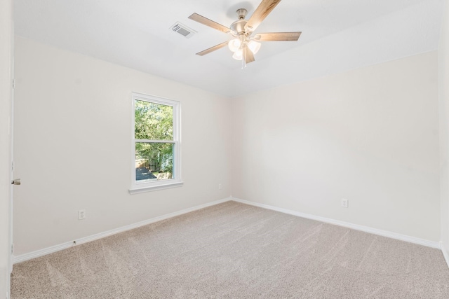 carpeted empty room with ceiling fan