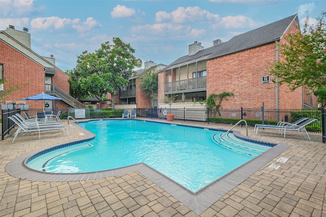 view of pool with a patio area