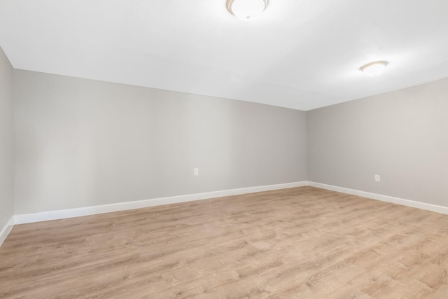 unfurnished room featuring light hardwood / wood-style floors