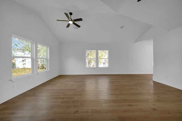 unfurnished living room featuring ceiling fan, lofted ceiling, and dark wood-type flooring