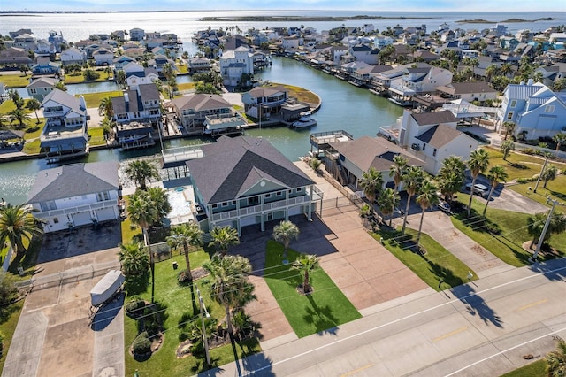 bird's eye view with a water view