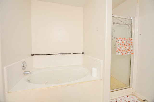 bathroom with shower with separate bathtub