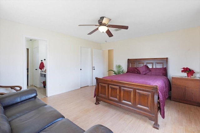 bedroom featuring light hardwood / wood-style floors and ceiling fan