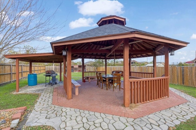 view of patio / terrace featuring a gazebo and grilling area