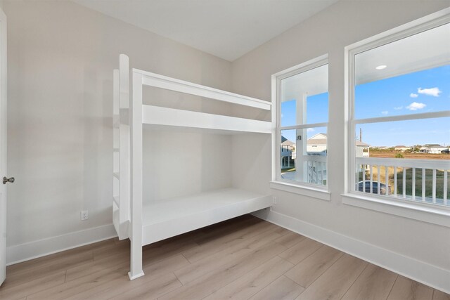 unfurnished bedroom featuring light hardwood / wood-style flooring