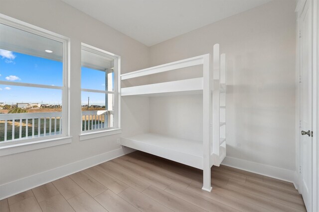 unfurnished bedroom featuring light hardwood / wood-style floors