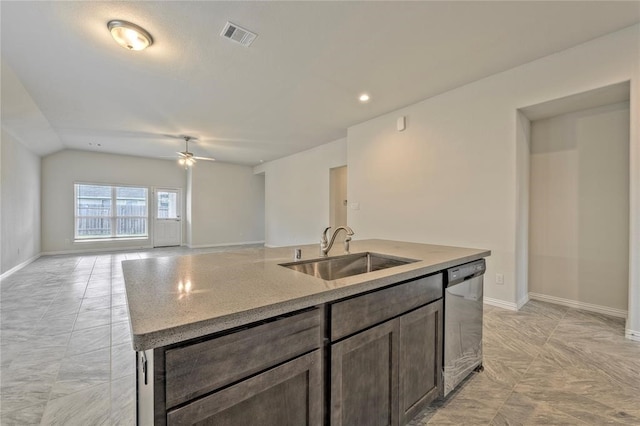 kitchen featuring dishwasher, sink, ceiling fan, an island with sink, and light stone counters