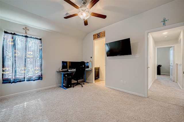 carpeted home office with ceiling fan and lofted ceiling