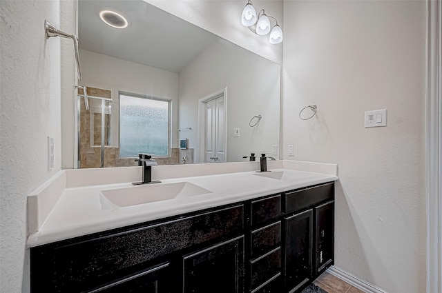 bathroom featuring vanity and walk in shower