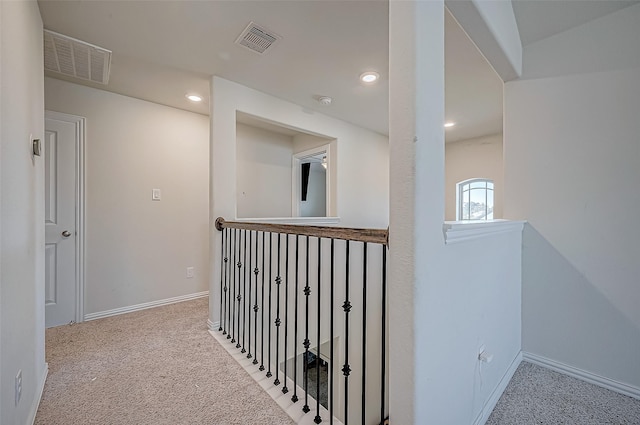 corridor with carpet floors