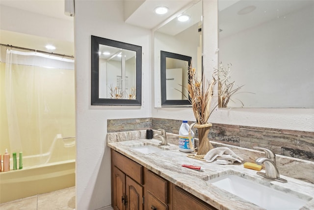 bathroom with tile patterned flooring, vanity, and shower / bath combo