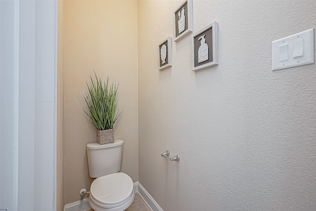 bathroom featuring toilet