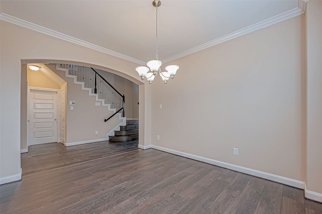 interior space with hardwood / wood-style floors, a chandelier, and ornamental molding