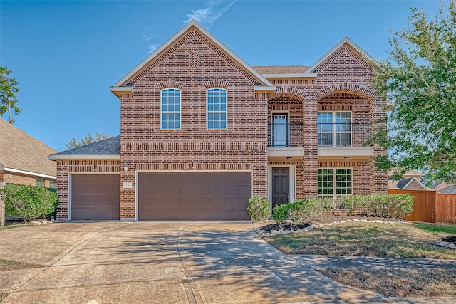 view of front of house featuring a balcony and a garage