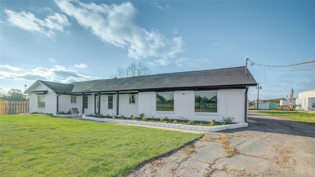 view of front of home with a front yard