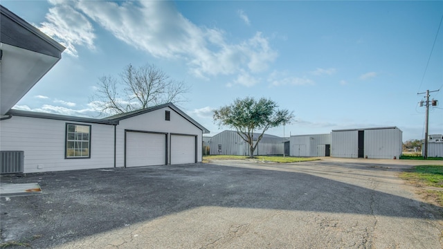 garage featuring central AC unit