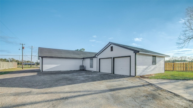 garage featuring central AC unit