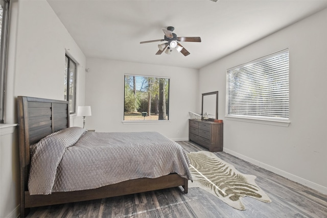 bedroom featuring hardwood / wood-style flooring and ceiling fan