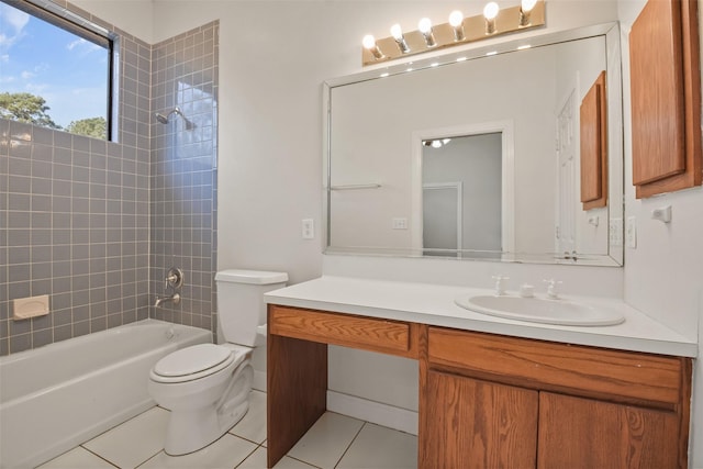 full bathroom with tile patterned floors, vanity, toilet, and tiled shower / bath