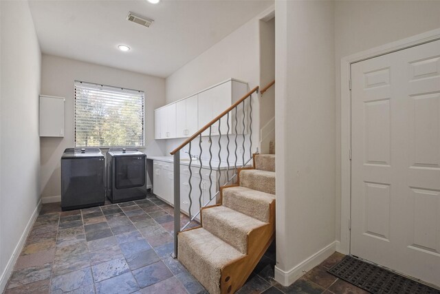 entryway featuring washing machine and clothes dryer