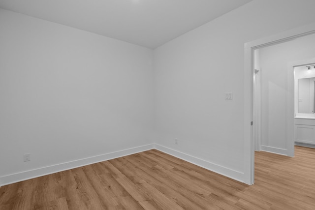 31915 Splendor Dr, Fulshear, TX 77441 - spare room with light wood-type flooring and baseboards