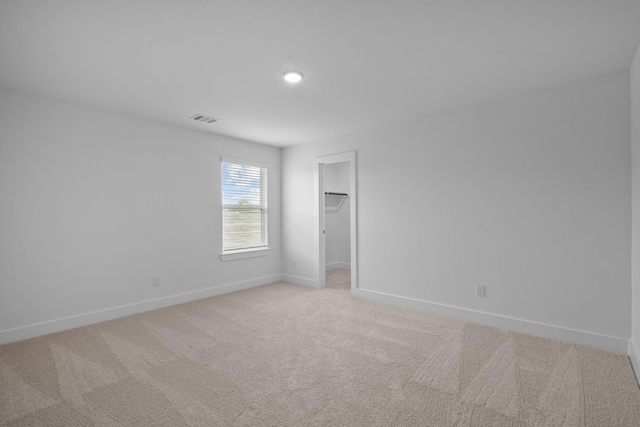31915 Splendor Dr, Fulshear, TX 77441 - spare room featuring baseboards and light colored carpet
