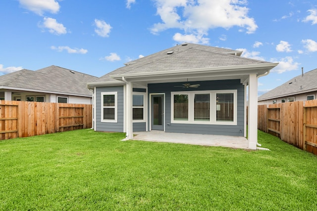 31915 Splendor Dr, Fulshear, TX 77441 - back of house with a ceiling fan, a patio area, and a shingled roof