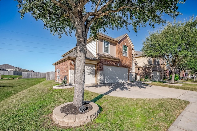 front of property featuring a front lawn and a garage