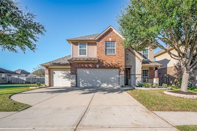 front of property with a front yard and a garage