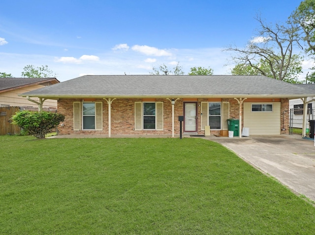 ranch-style house with fence, a front lawn, and brick siding