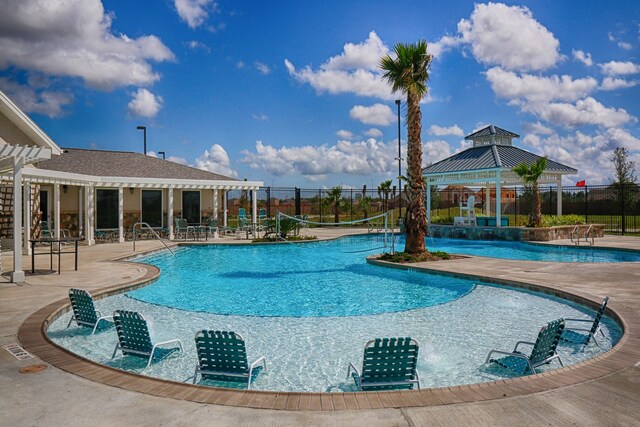 view of swimming pool featuring a gazebo and a patio