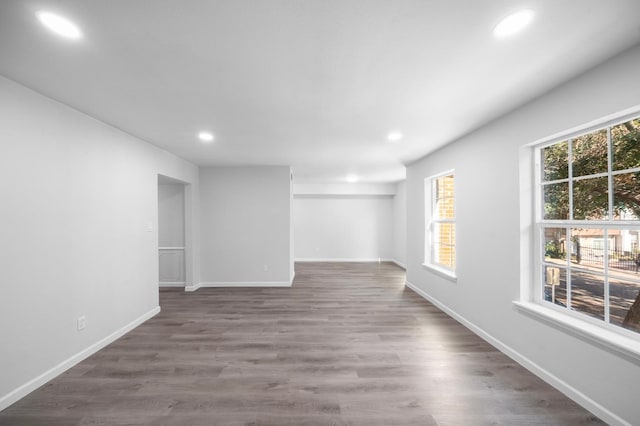 spare room featuring dark hardwood / wood-style flooring