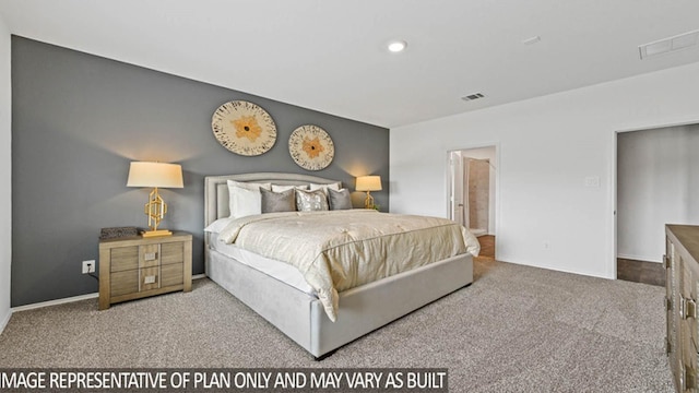 bedroom featuring carpet flooring and ensuite bath