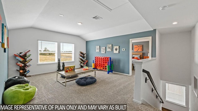 carpeted living room featuring lofted ceiling