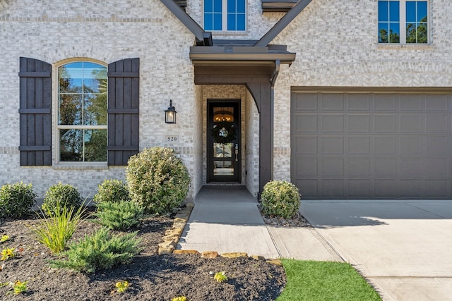 doorway to property featuring a garage