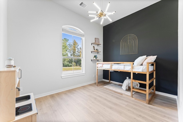 bedroom featuring light hardwood / wood-style floors