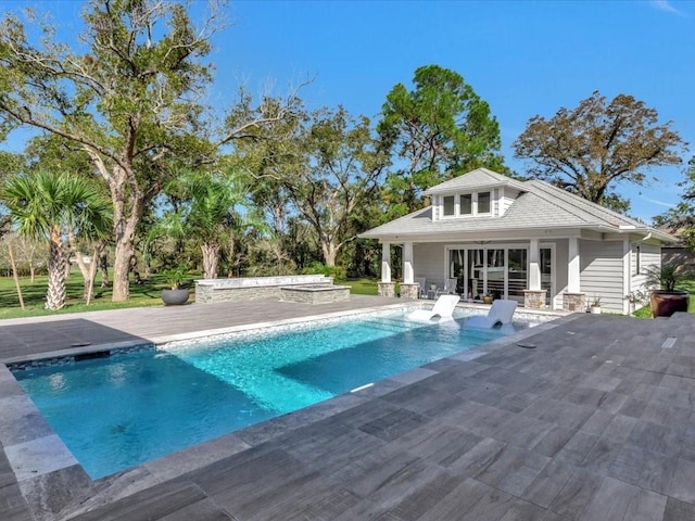 view of pool featuring a patio