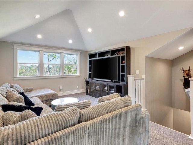 living room with carpet floors and vaulted ceiling