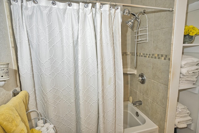 bathroom with shower / tub combo with curtain