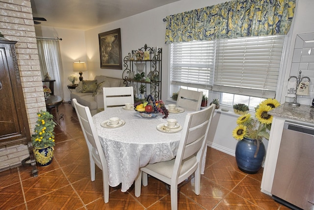 dining space with ceiling fan