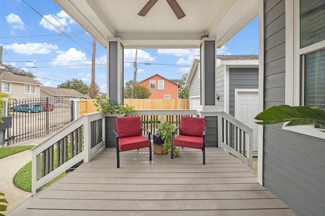 deck featuring ceiling fan and covered porch