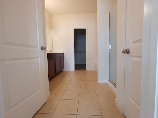 bathroom with vanity, separate shower and tub, and tile patterned floors