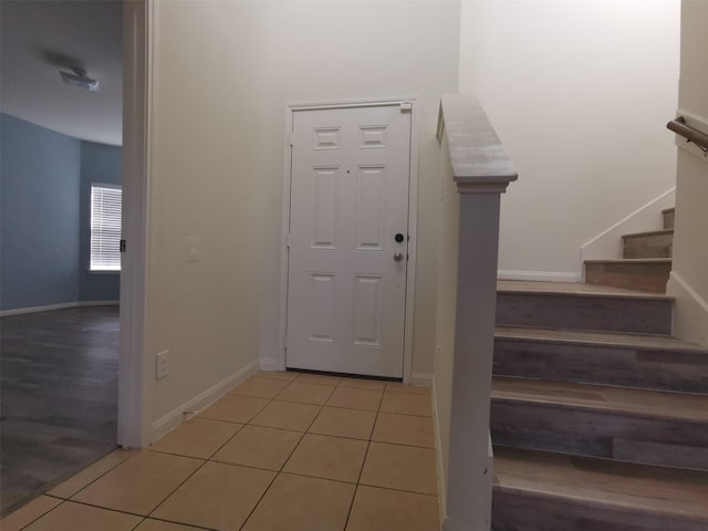 view of tiled entrance foyer