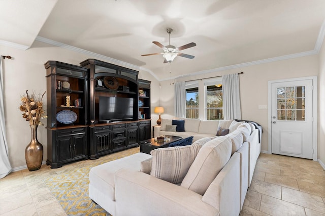 living room with ceiling fan and crown molding