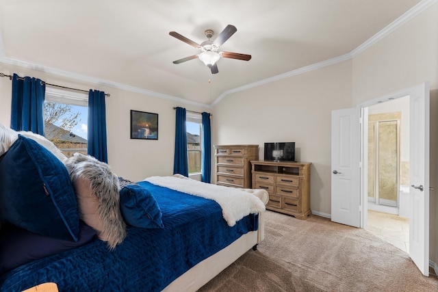 carpeted bedroom with ceiling fan, crown molding, and ensuite bathroom