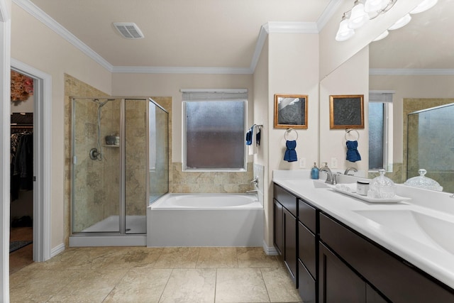 bathroom with crown molding, vanity, and independent shower and bath